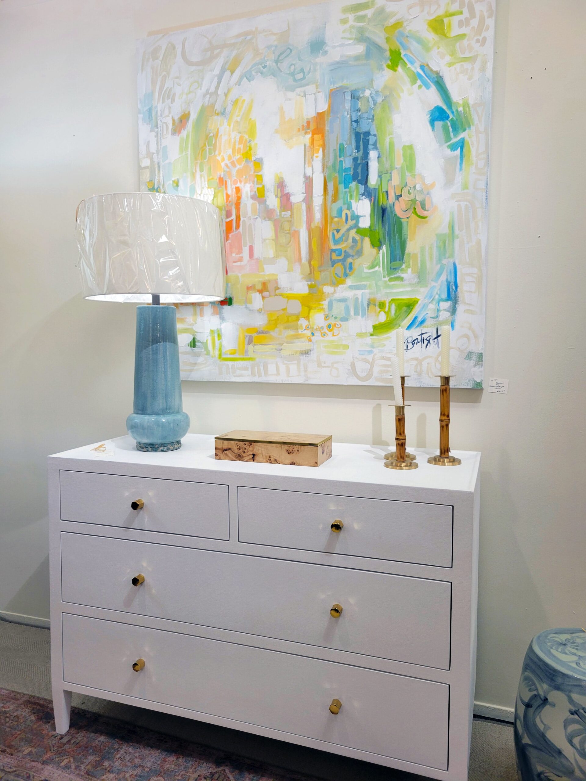 modern dresser with colorful abstract art