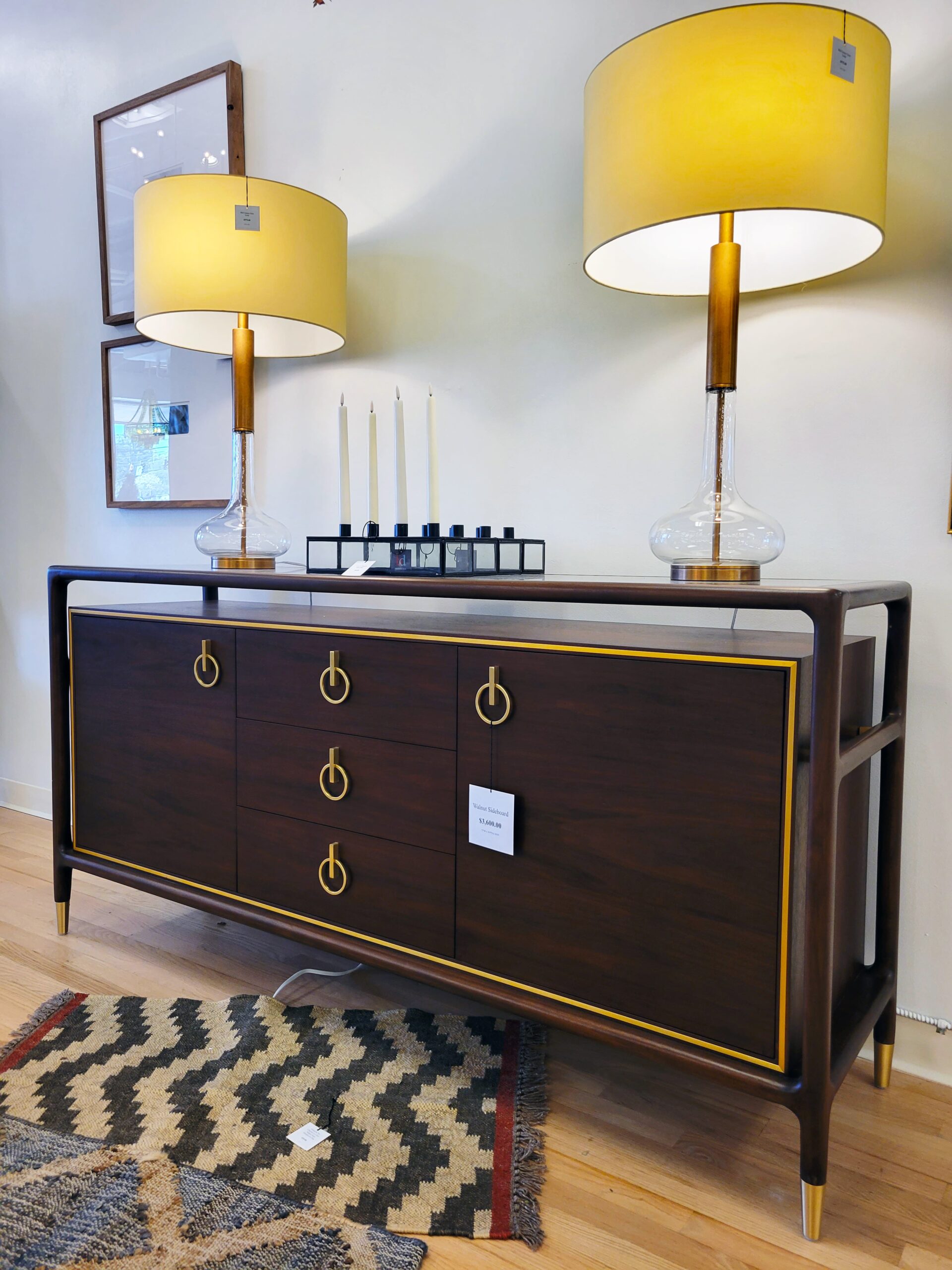 brown and gold sideboard with set of lamps