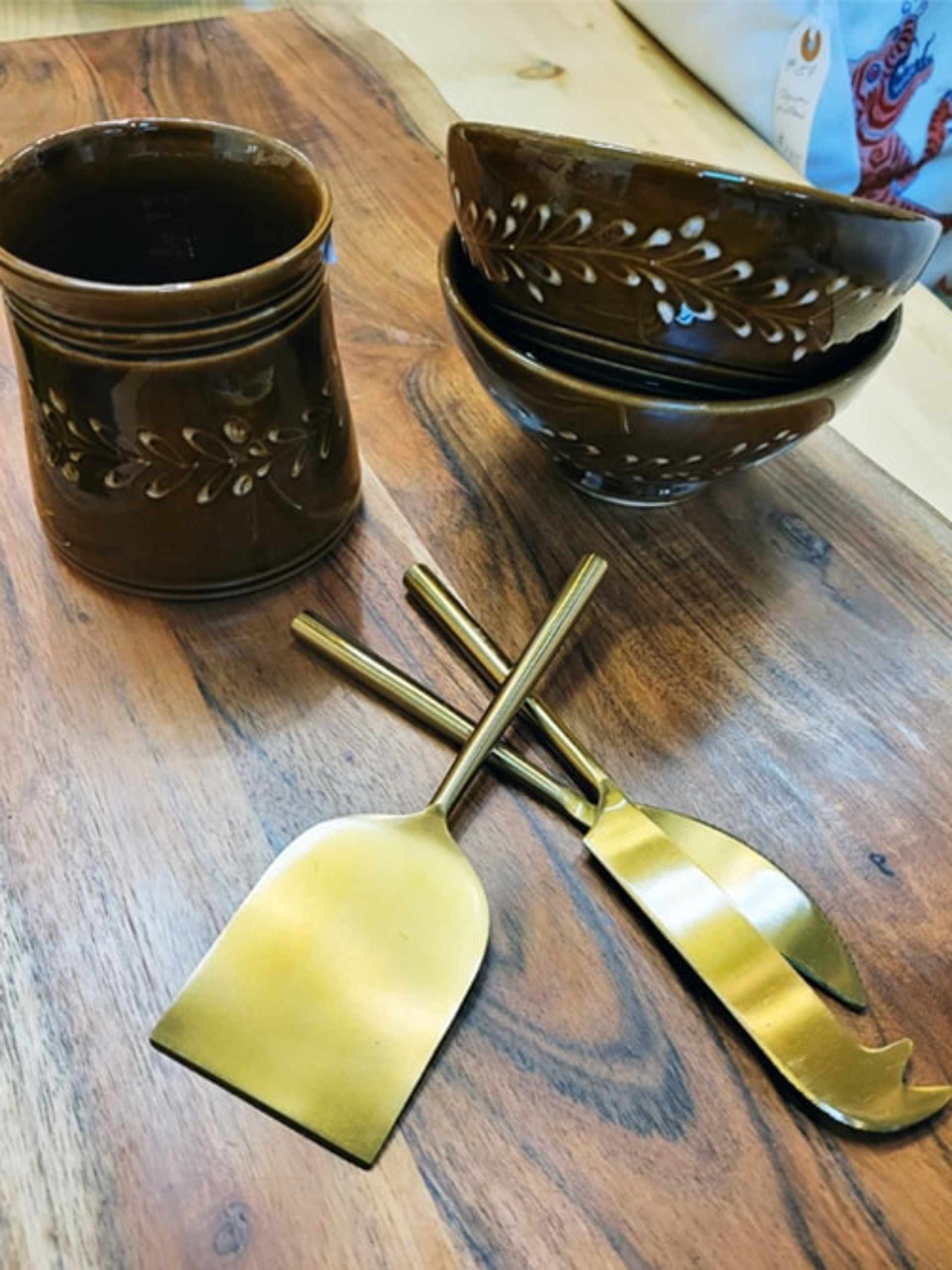 handmade ceramic bowls with golden cutlery set